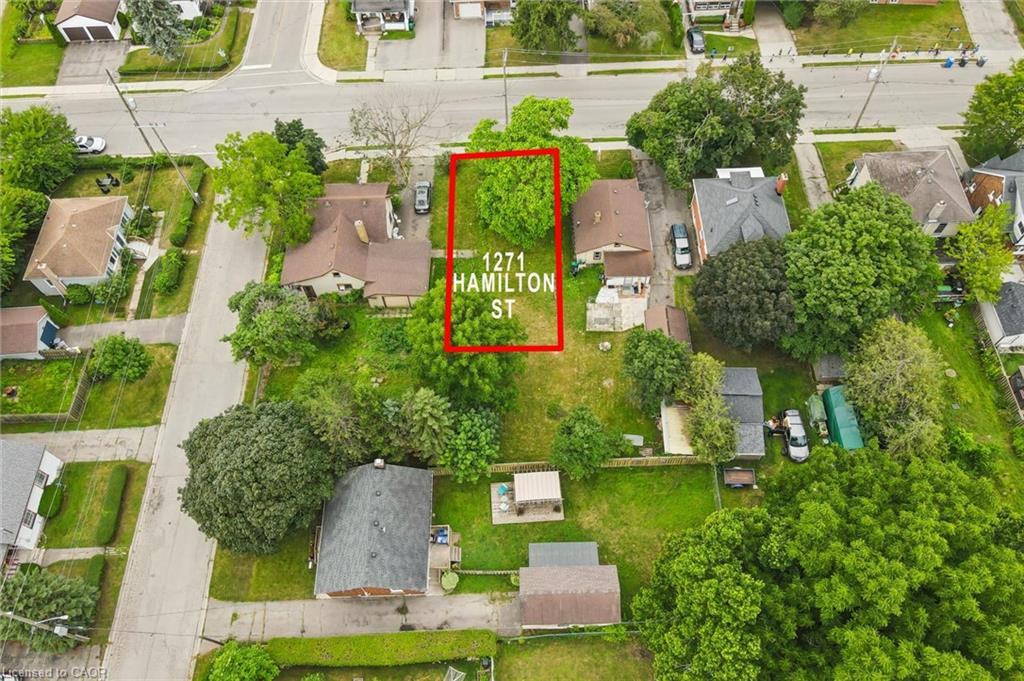 1271 Hamilton Street features a substantial corner lot with mature landscaping, lush tree coverage, and expansive grounds