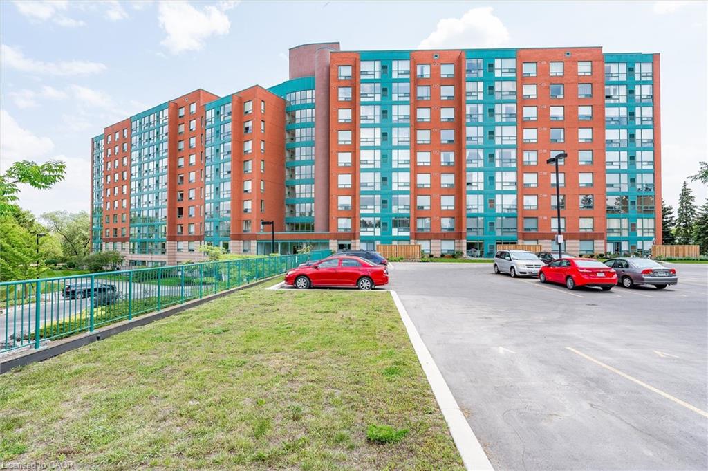 Large lot with lots of visitor parking and stairway to take you down to the front entrance