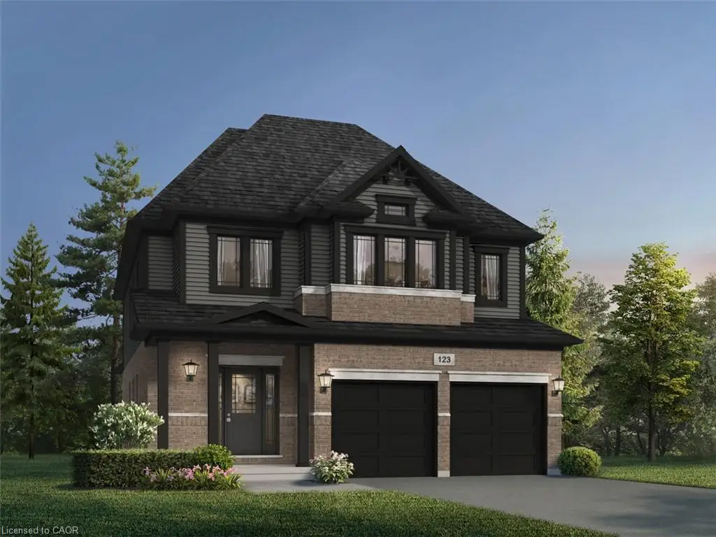 Two-story residence featuring a brick and horizontal siding exterior, steep-pitched asphalt shingle roof, gabled dormer, and an attached two-car garage