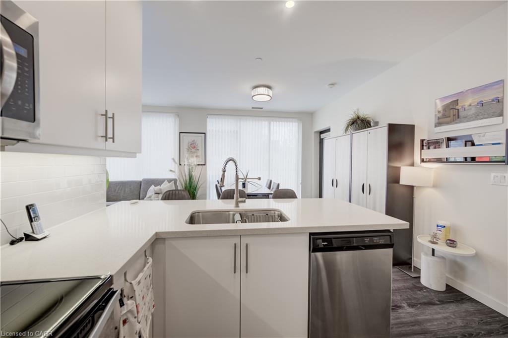 Kitchen overlooking dining and living