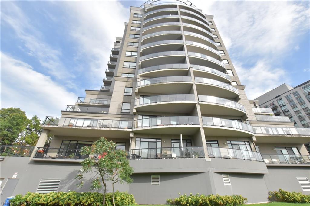 Modern high-rise with tiered balconies and full-length glass railings