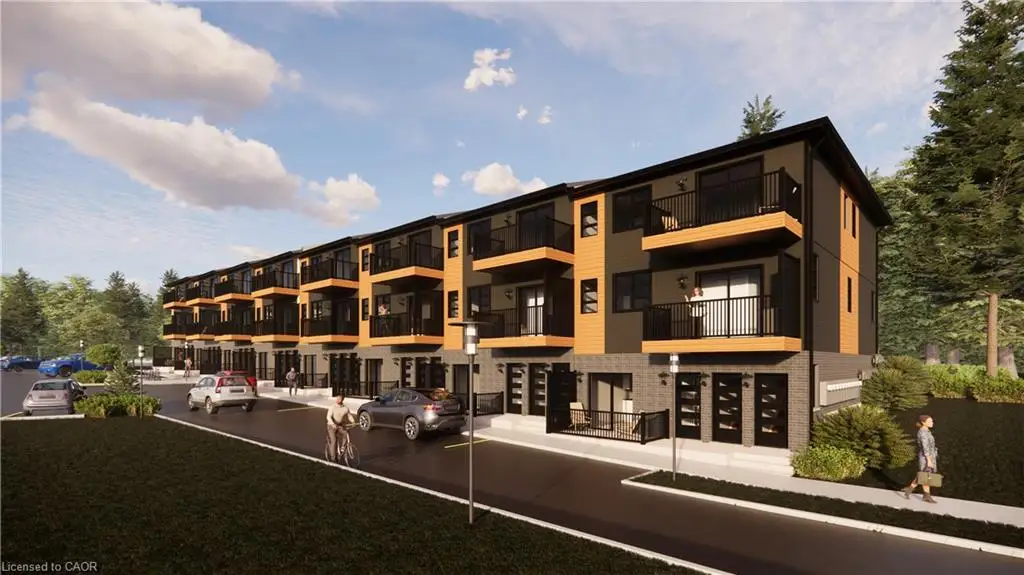 Contemporary multi-story building with dark siding and wood-finish accents