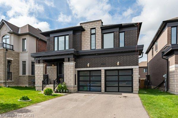 Contemporary facade featuring brick and stone cladding