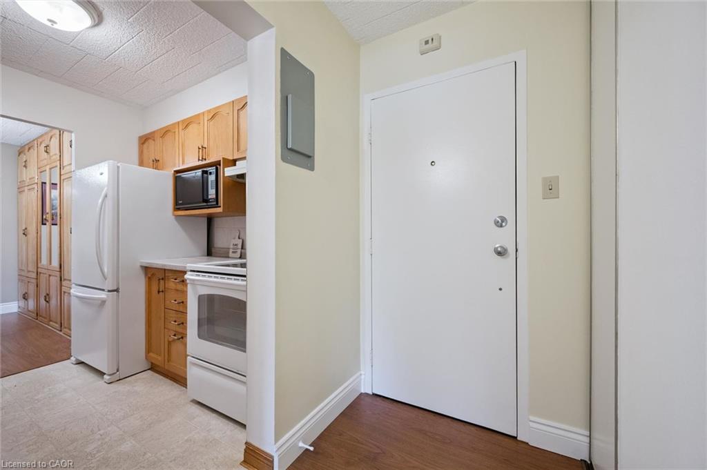 White front entry door with chrome hardware
