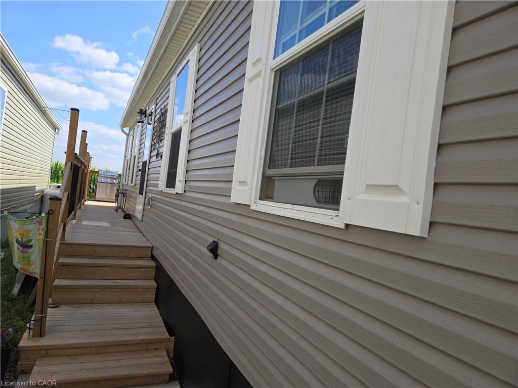 Side entrance view with a run along deck.