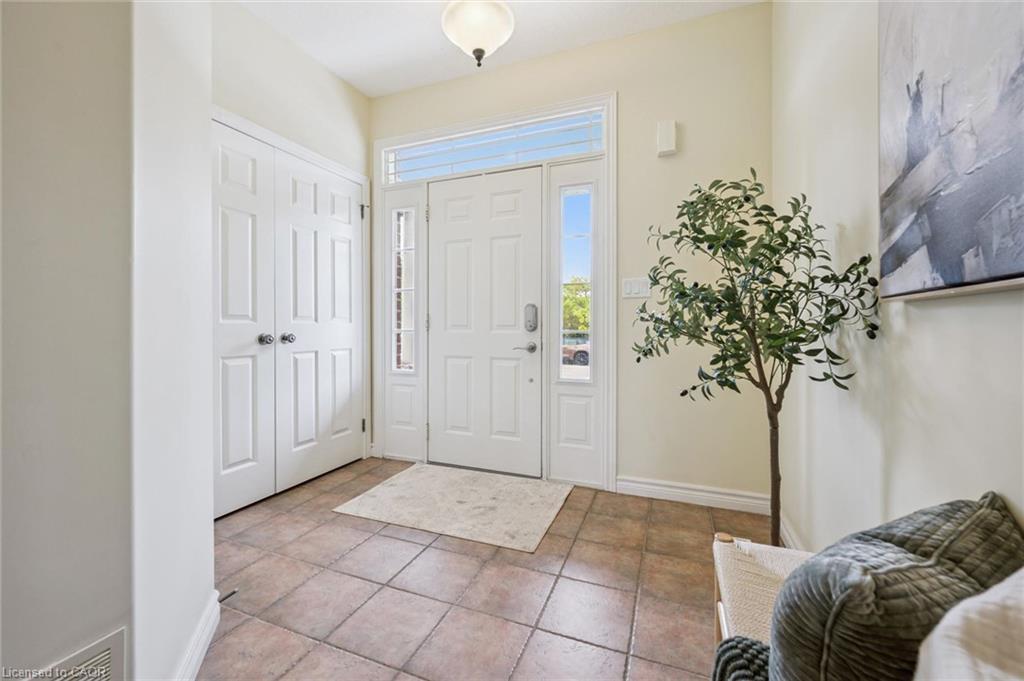 Welcoming foyer with closet.