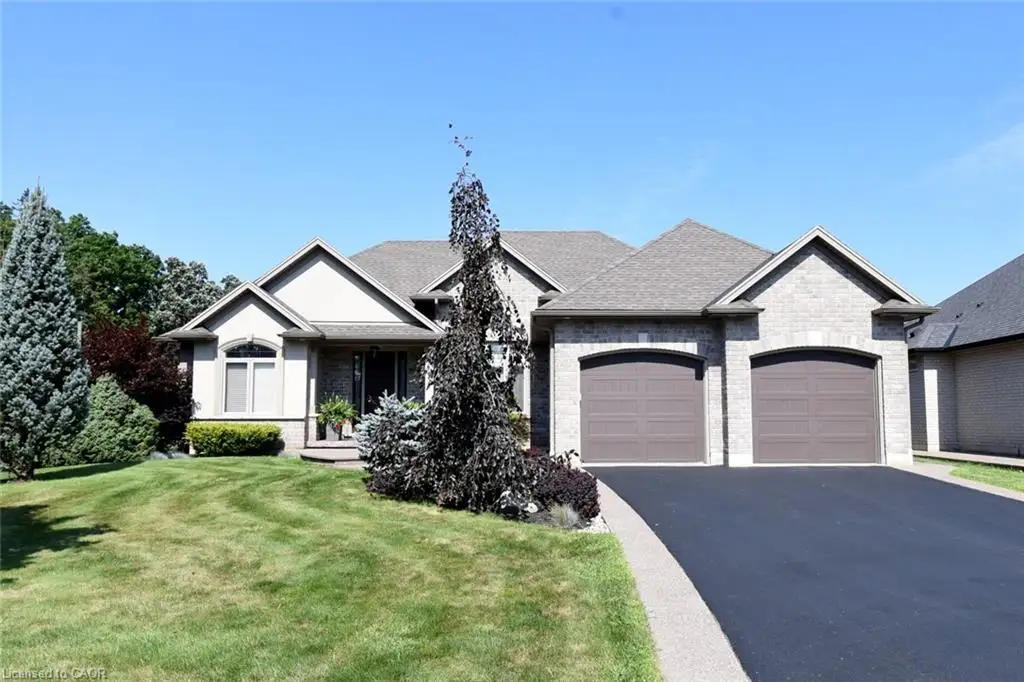 Brick and stucco exterior with gabled roof lines