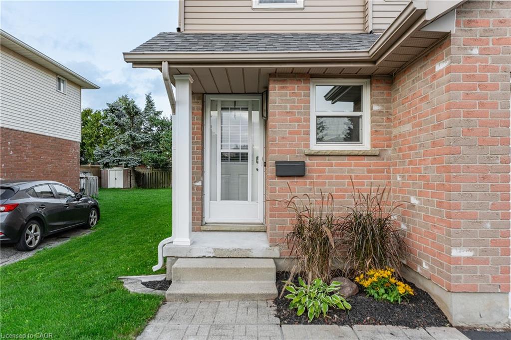 Brick and siding exterior with covered porch entry