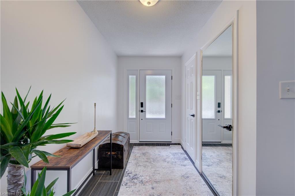 Spacious Foyer with powder room and walk-in closet