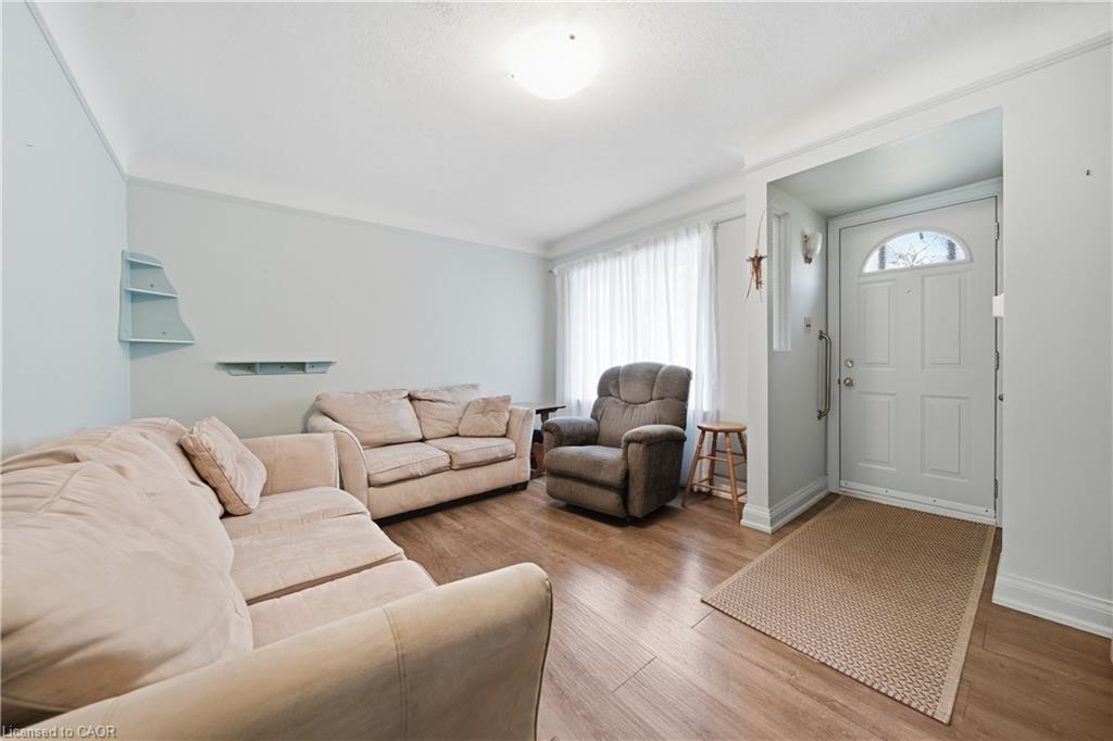 Living room with wood-finish flooring throughout