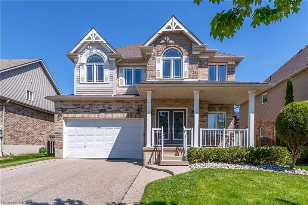 Front of home with double garage & driveway