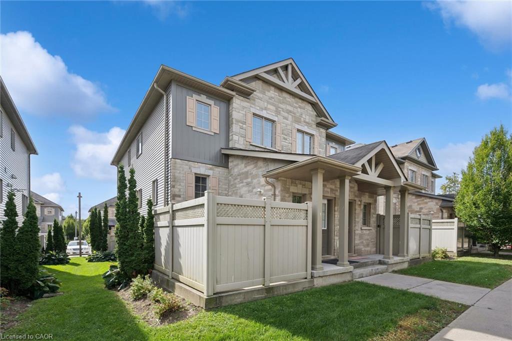 Stone veneer and siding exterior with gabled roof accents