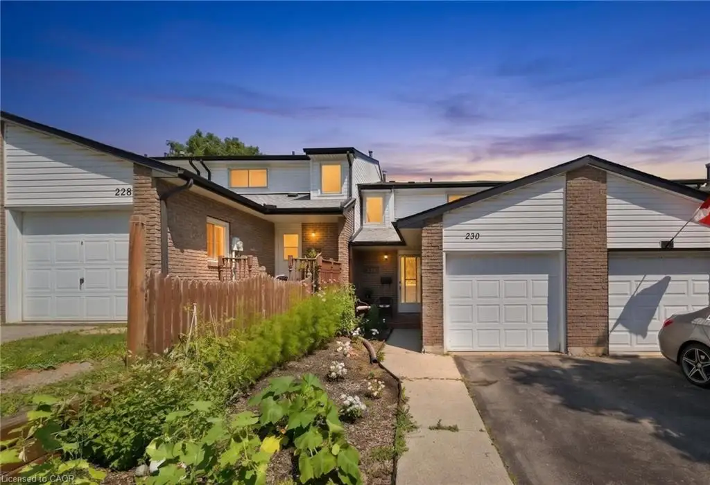 Brick and siding exterior with pitched roofs