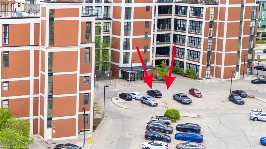 Two premium located, side by side parking spaces. Right at the front door of the building