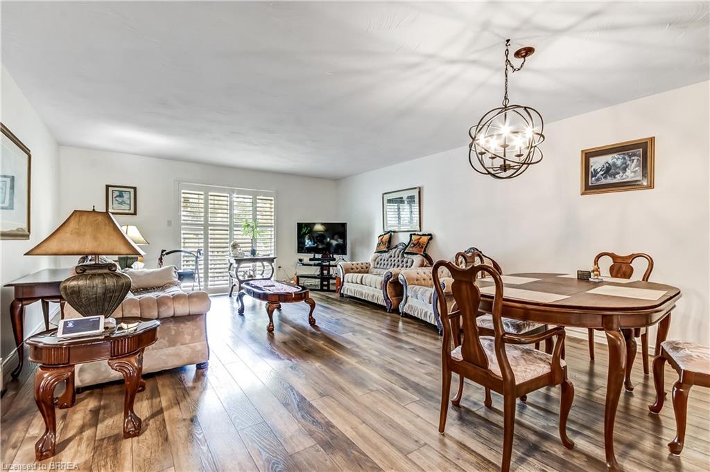 Open concept living and dining area with access to the private deck.