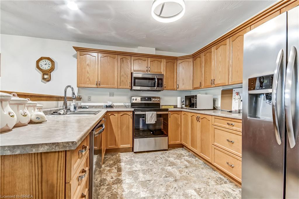 Large kitchen with plenty of cabinets and countertop space.  Stainless appliances included.