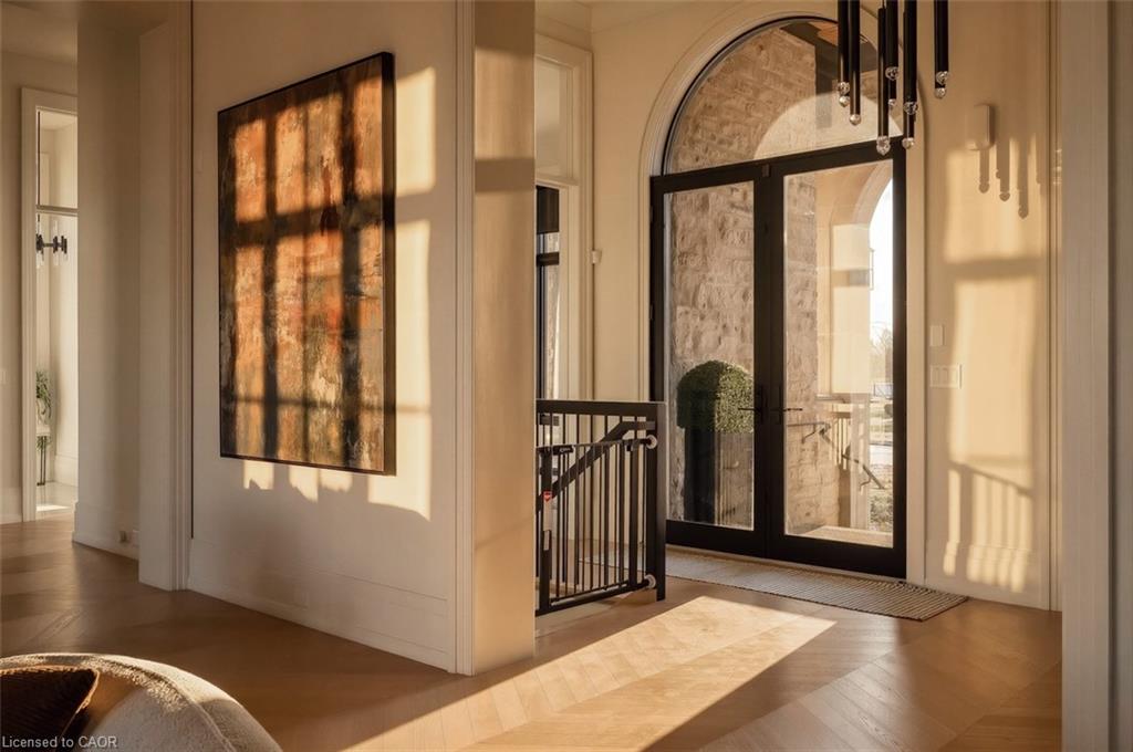 Doorway to outside featuring wood finished floors and french doors