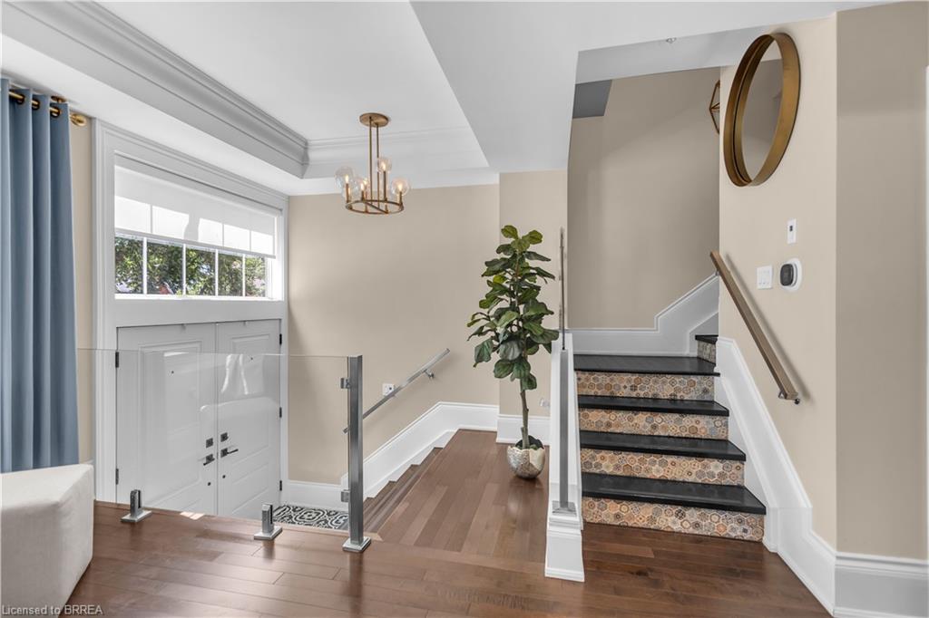 View of the entry and stairs leading to second storey.