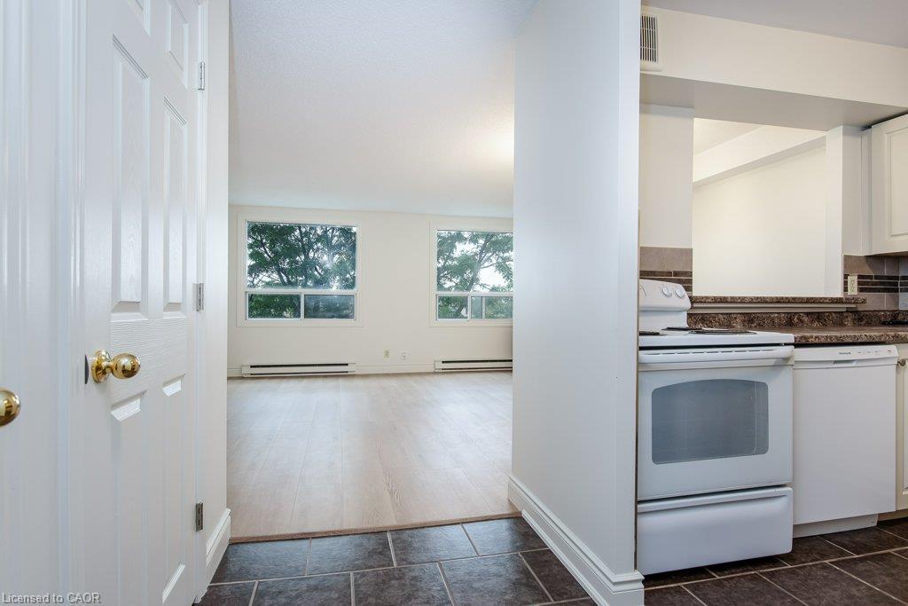 White paneled door with brass hardware