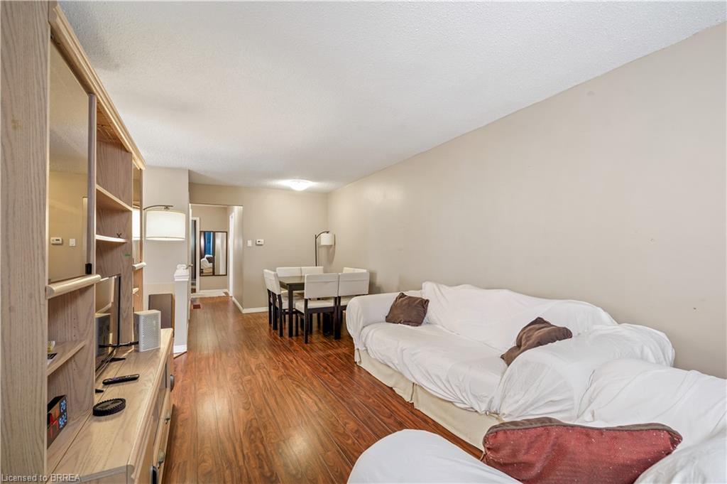 Wood-finish flooring throughout the living and dining areas