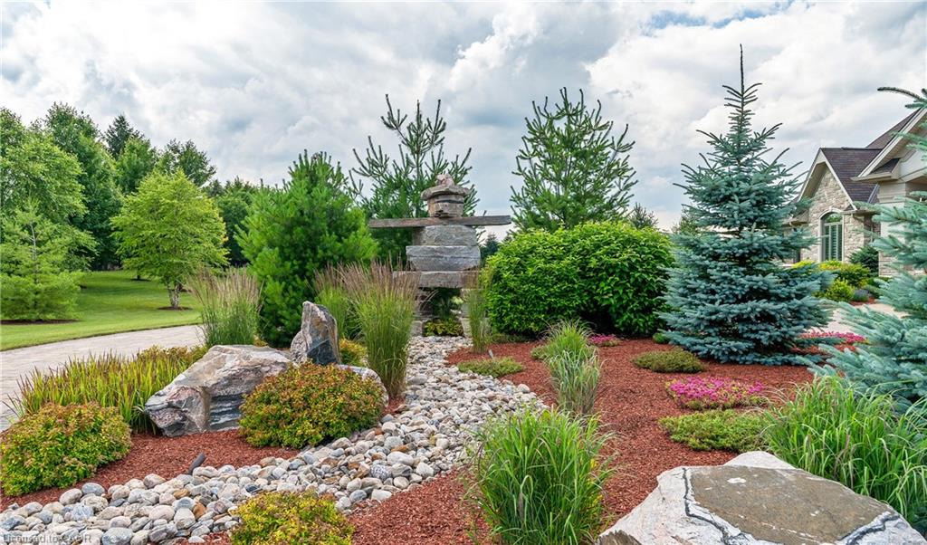 Grand roundabout w/ centrepiece inukshuk sculpture