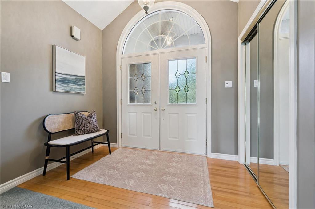 Double entry doors with decorative glass panels