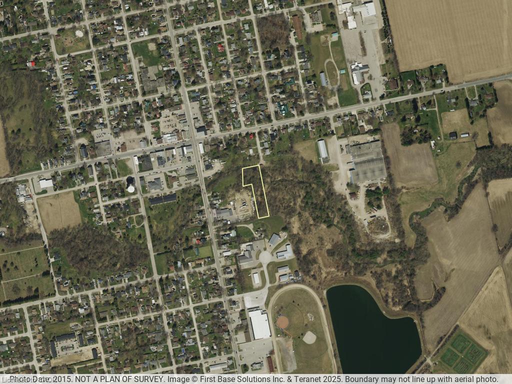 Aerial Photograph. Depicting the property boundary within a broader geographical context