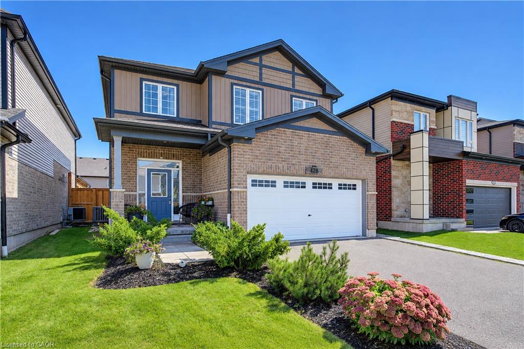 Brick and siding exterior with dark trim accents