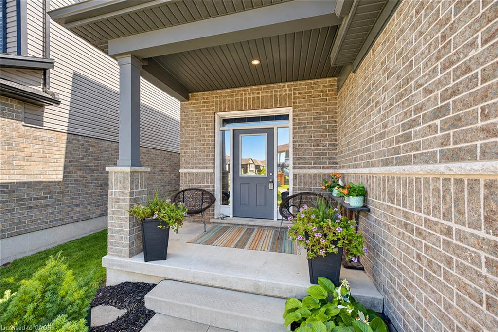 Brick exterior with stone accents and siding
