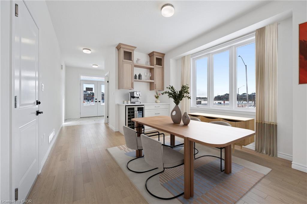 Oak hardwood flooring extends through the space