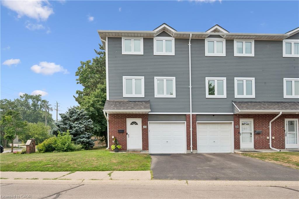 Brick and siding exterior with individual garages and private entrances