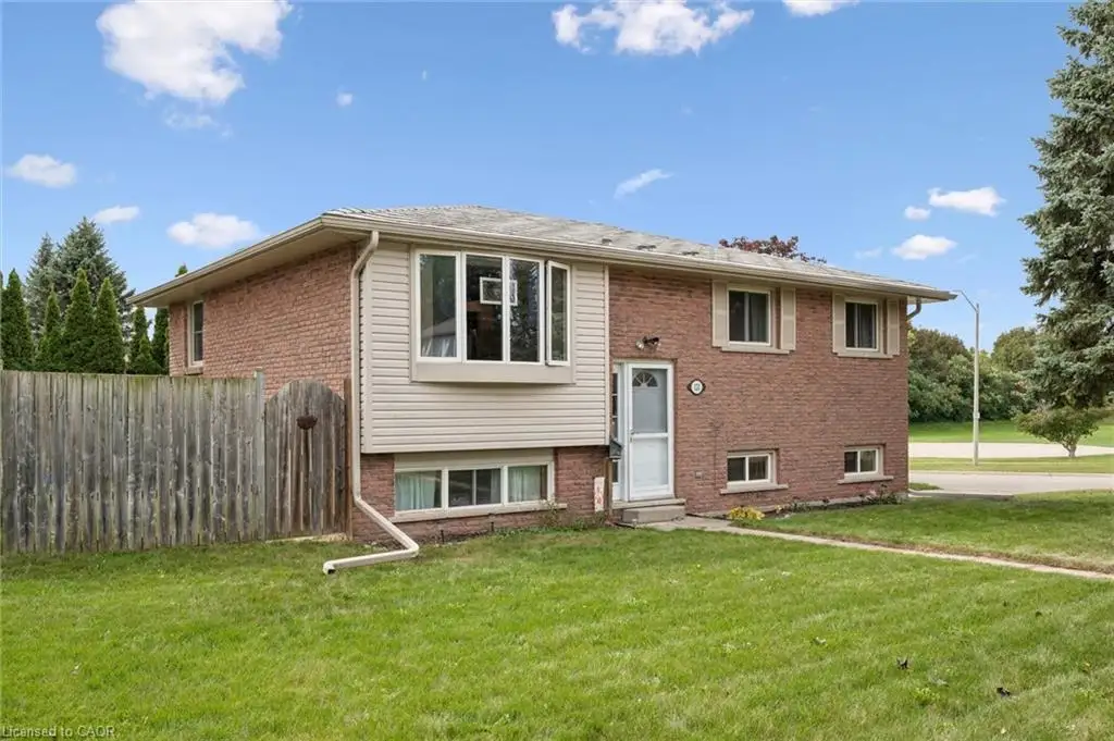 Brick exterior with light-colored siding accents