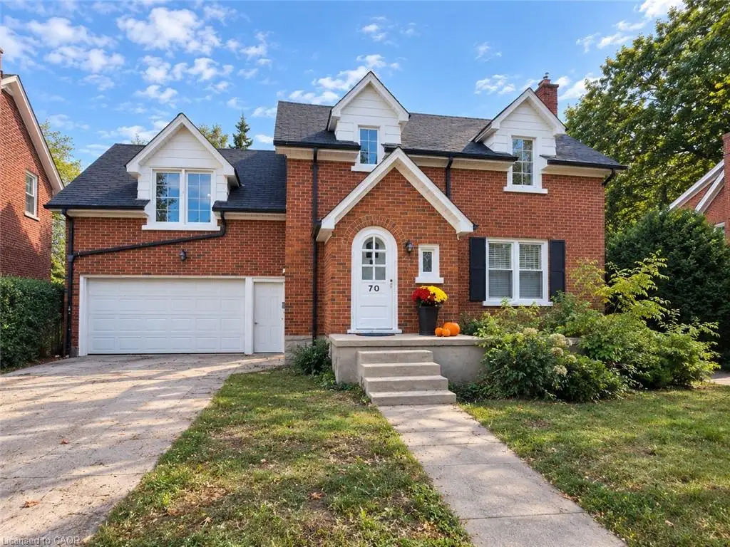 Brick exterior with white dormer windows