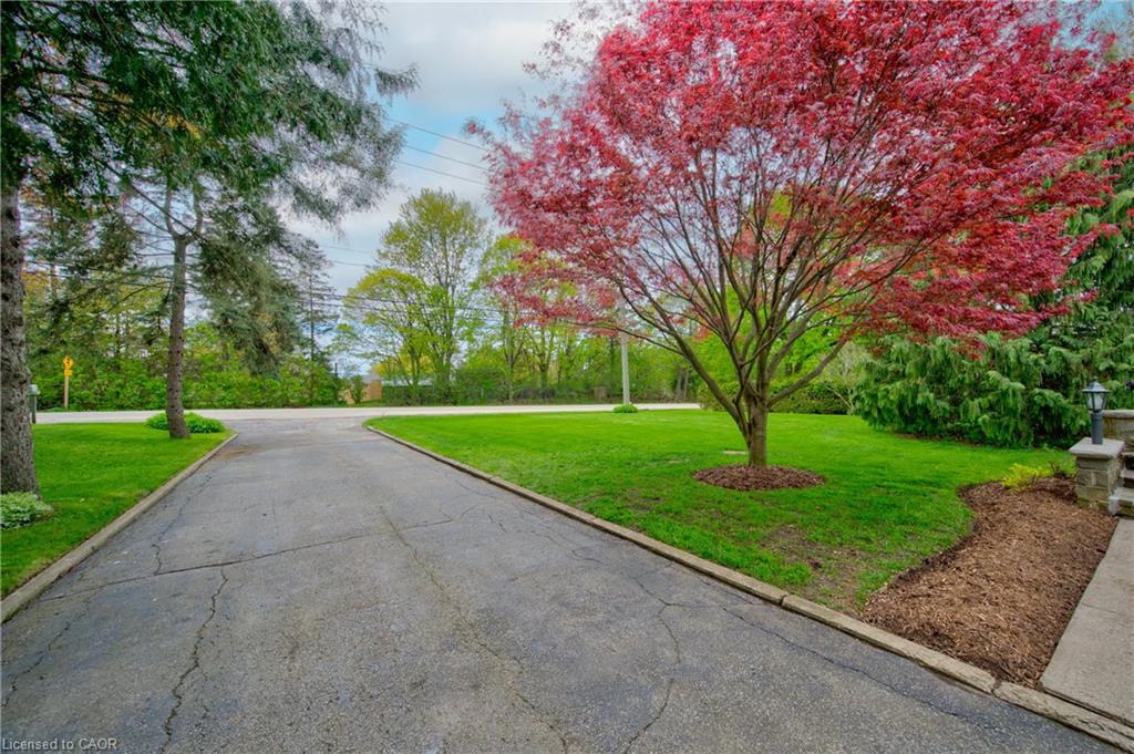 Spacious paved driveway with plenty of room plus the double garage.