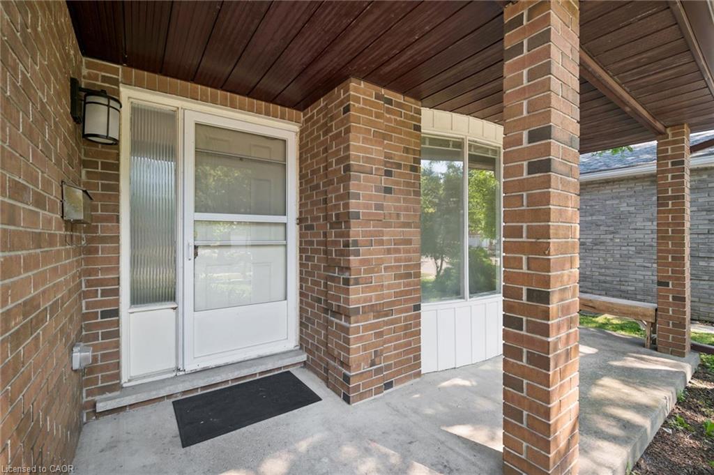 Brick exterior with a covered porch