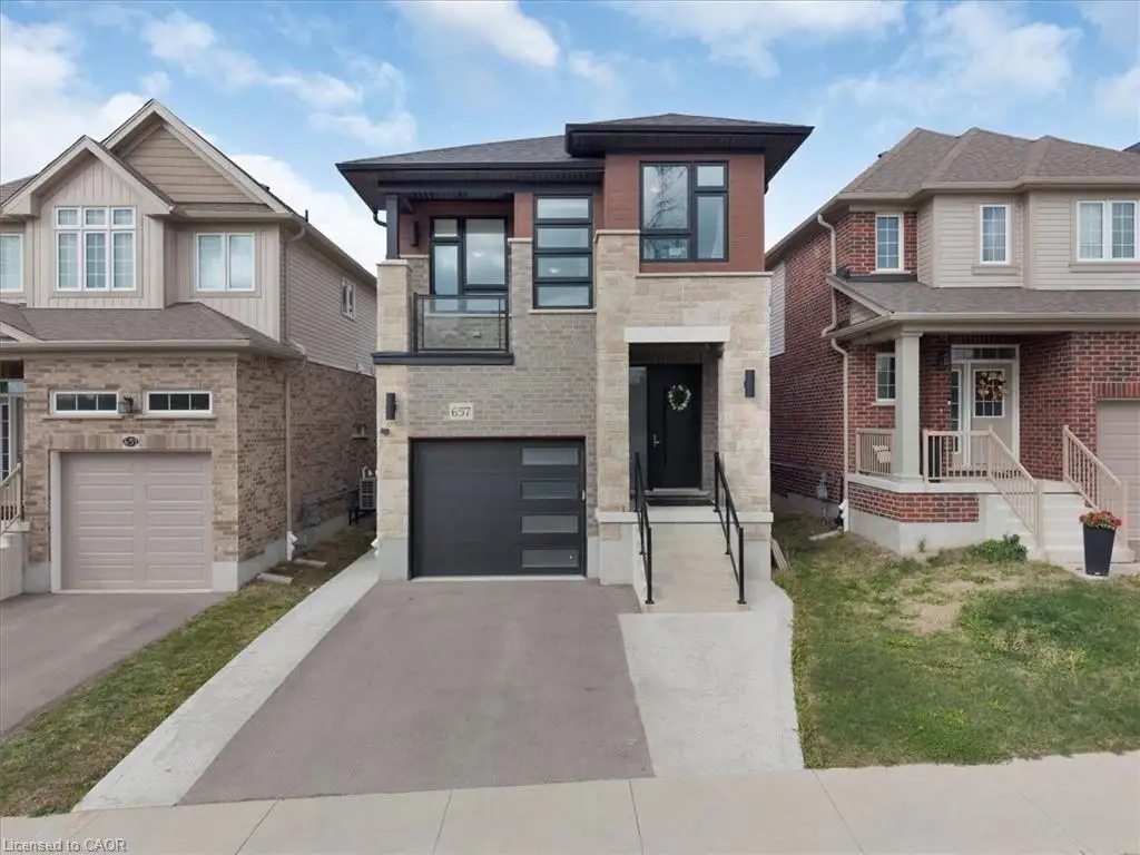 Modern facade featuring stone veneer, dark brick, and wood-look paneling