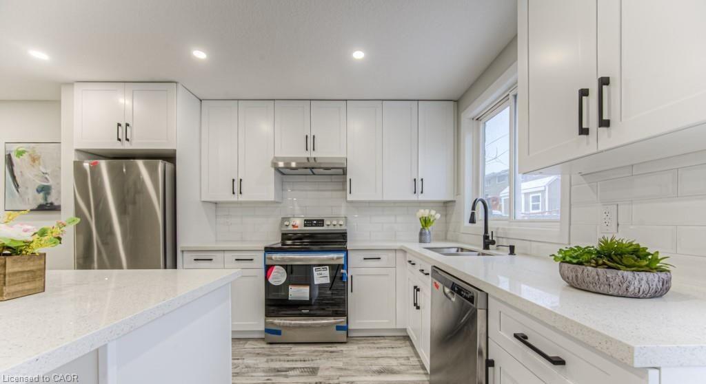 White cabinetry and quartz countertops