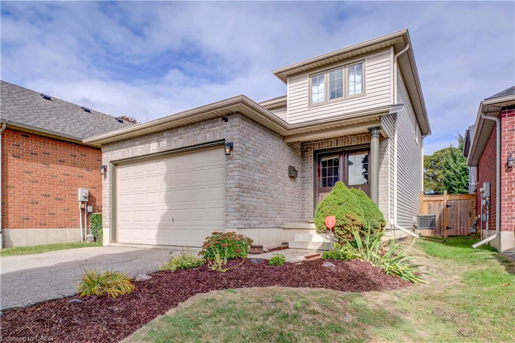 Brick and siding exterior with an integrated garage