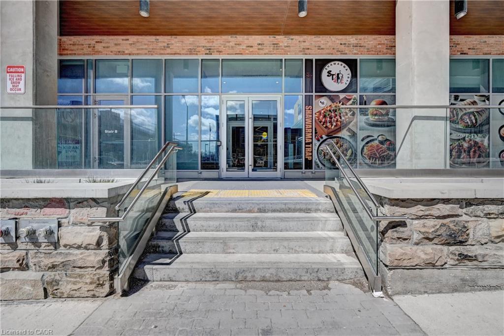 Concrete steps with stainless steel and glass railings