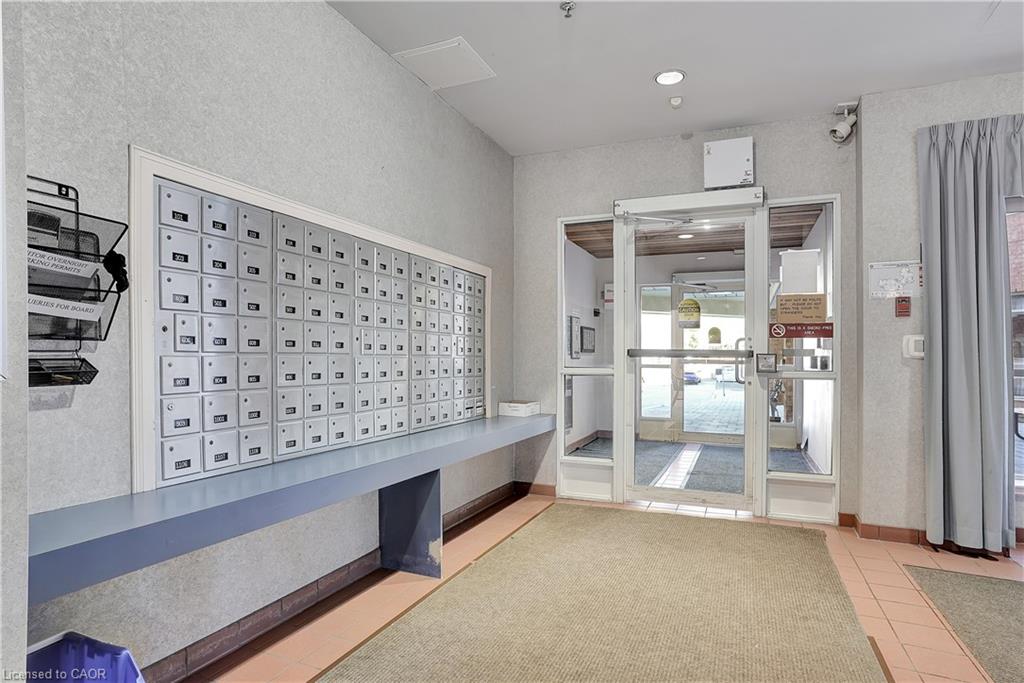 Community mailbox station featuring individual mailboxes and a built-in counter
