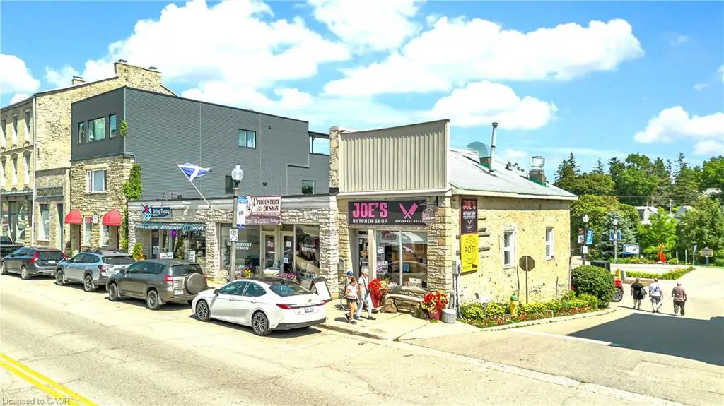 Additional contentThis image depicts a street-facing commercial storefront with mixed-use buildings rather than a residential property suitable for standard real estate listing description