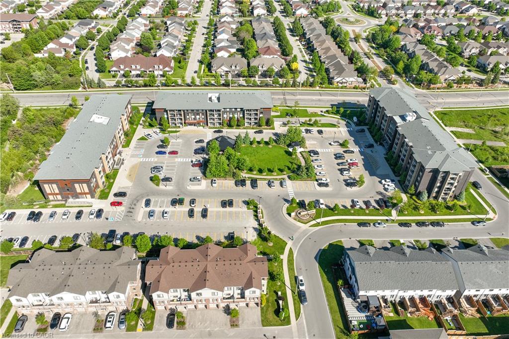 Aerial perspective showcasing a residential development with multiple multi-story apartment buildings