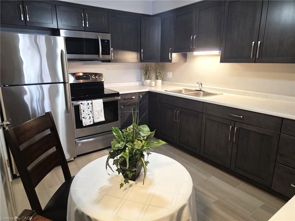 New kitchen, with new floors, lights, sink, under counter lighting