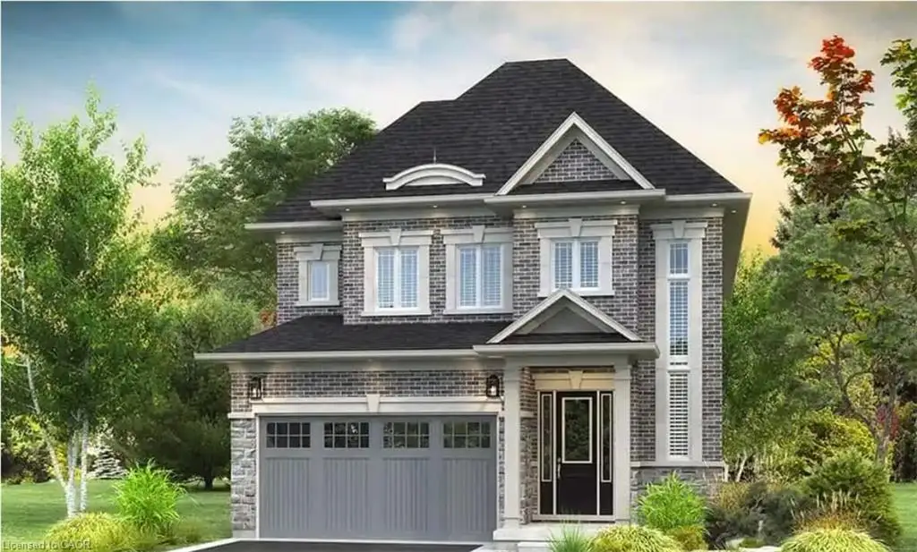 Brick and stone facade, dark shingle roof, integrated garage, covered entry, and decorative window surrounds