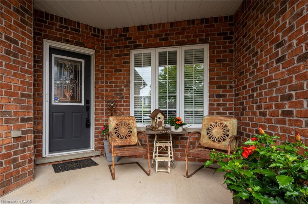 Brick exterior construction with a covered porch entry