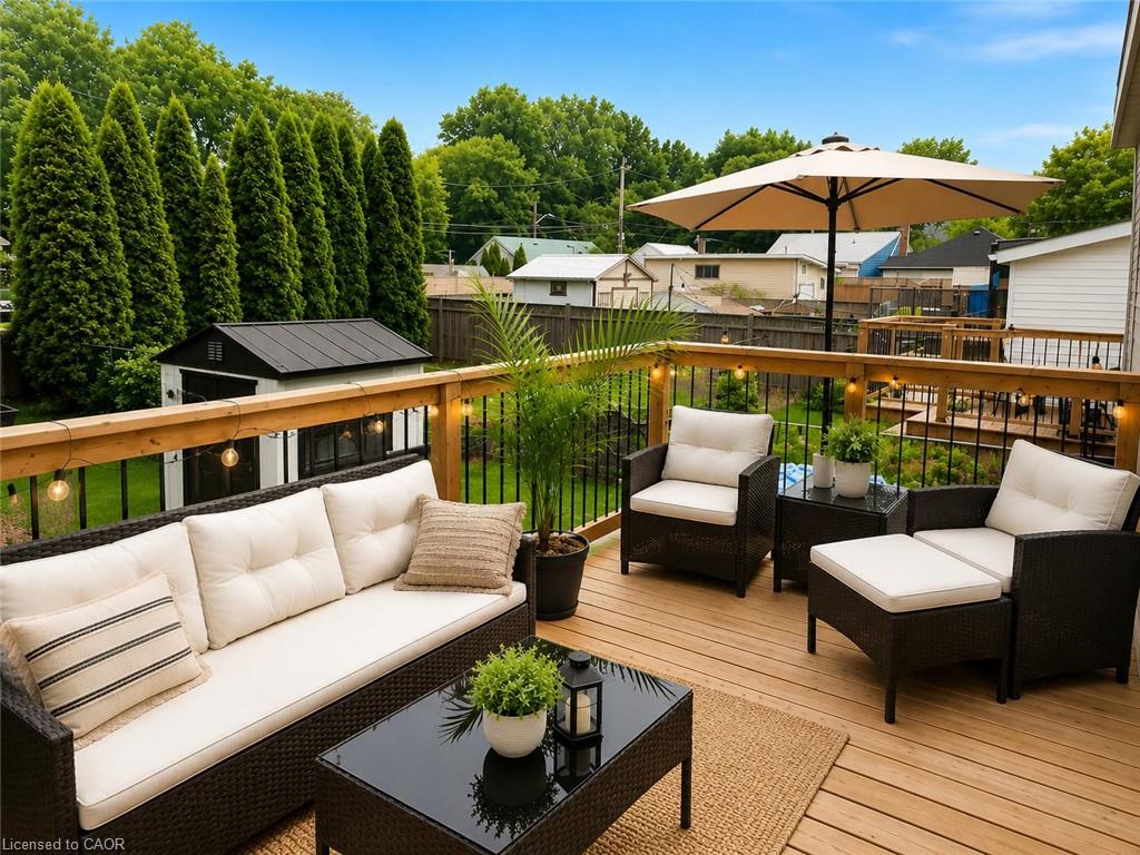 Expansive wooden deck with a built-in railing