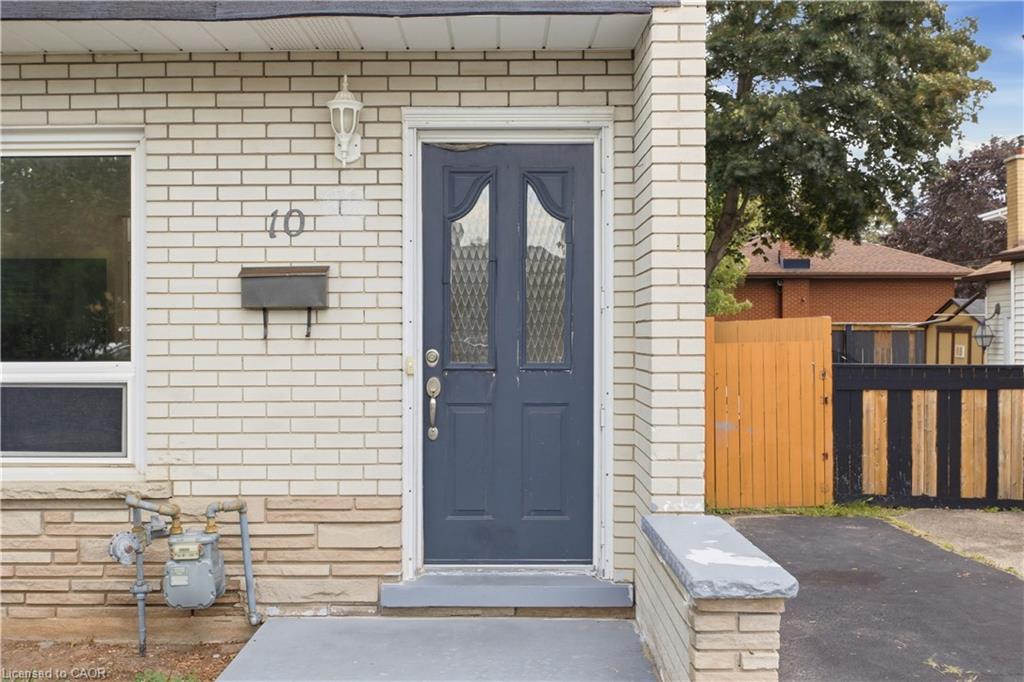 White brick exterior with stone accent detailing