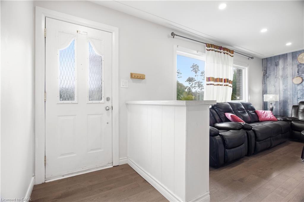 White entry door with decorative glass panels