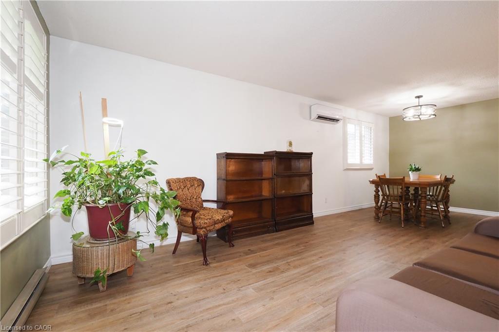 Living room with wall-mounted climate control unit