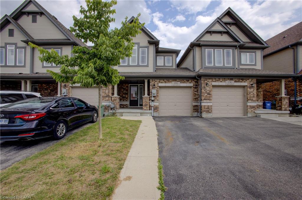 Stone and siding exterior with gabled roof lines
